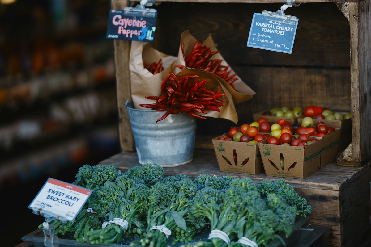 Fresh ingredients for prostate health including broccoli, tomatoes, pumpkin seeds and nuts
